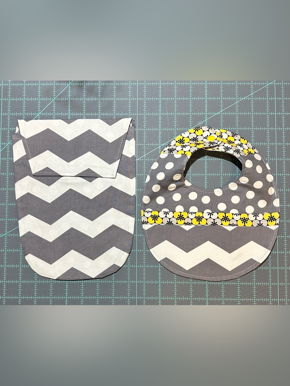 Gray Chevron Baby Bib and Diaper Pouch with Yellow Floral Accent